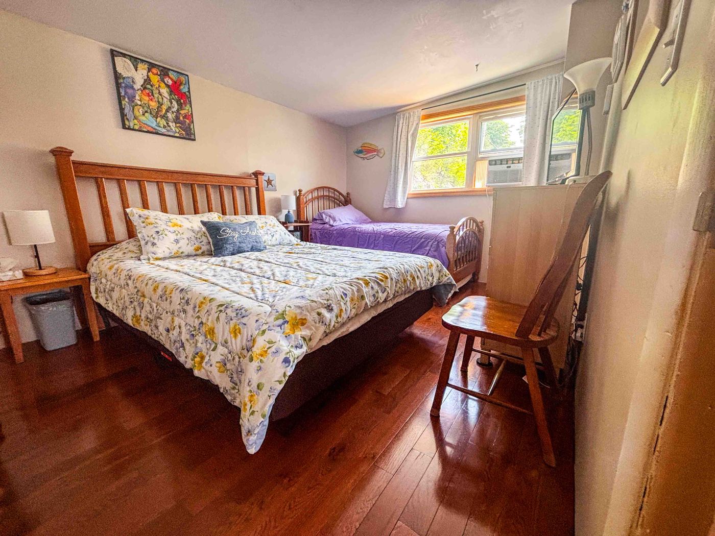Another Sunset Haven bedroom with a queen bed and a twin bed