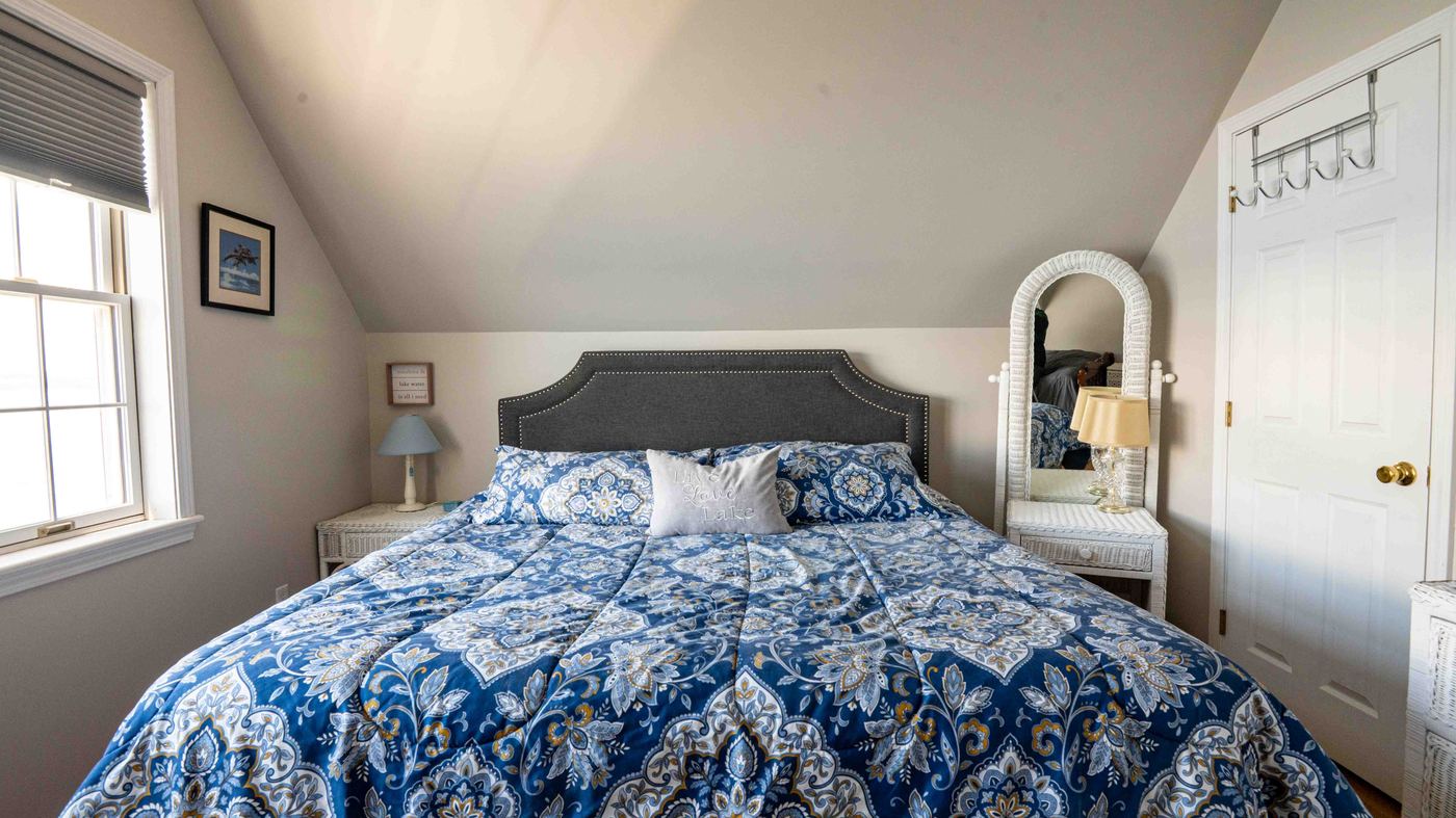 A bedroom at Sunset Oasis with a large bed and a twin bed